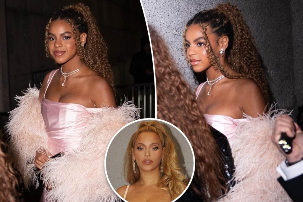 Beyoncé lookalike daughter Blue Ivy attends 2025 Angel Ball in New York City wearing pink satin dress and feathers
