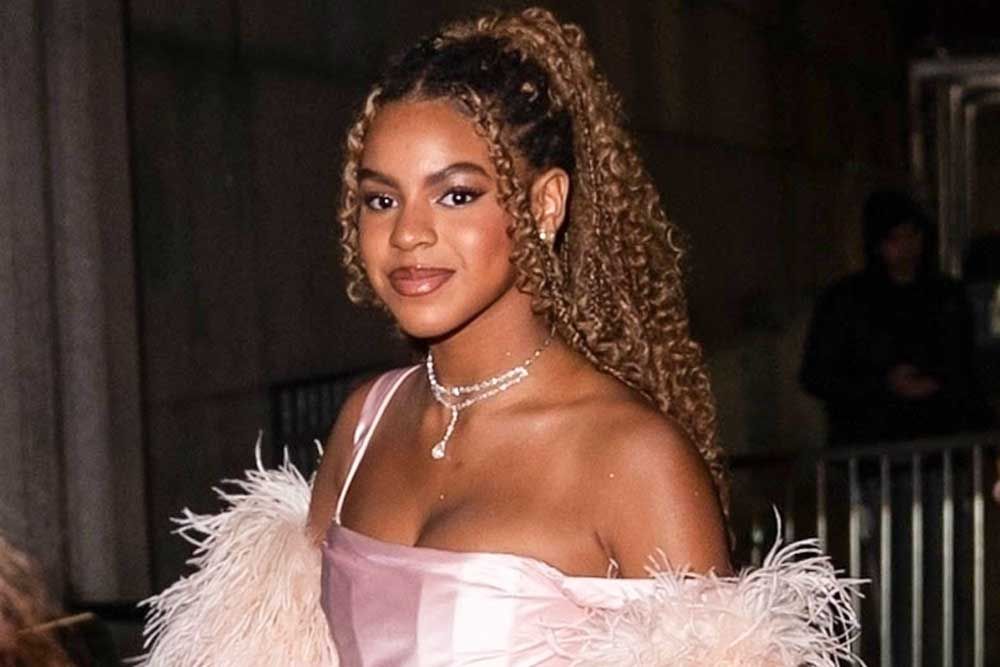 Blue Ivy Carter looks just like her mother Beyoncé in pink to support grandmother Tina Knowles in New York