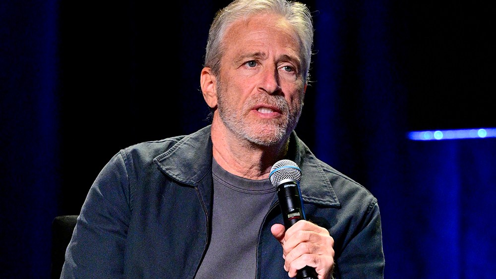 Jon Stewart says on The Daily Show amid the Paramount merger, “I’m working on staying on”
