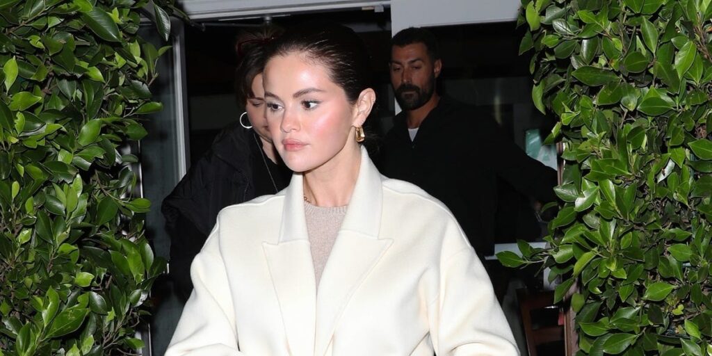 Selena Gomez wears white bridal coat and wedding ring in Los Angeles