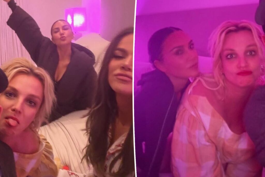Kim Kardashian and Britney Spears lounge in bed with Khloe