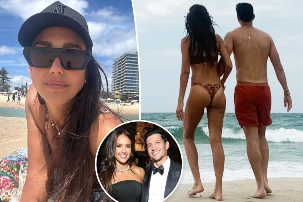 Jessica Alba rocks a thong bikini on the beach with Danny Ramirez