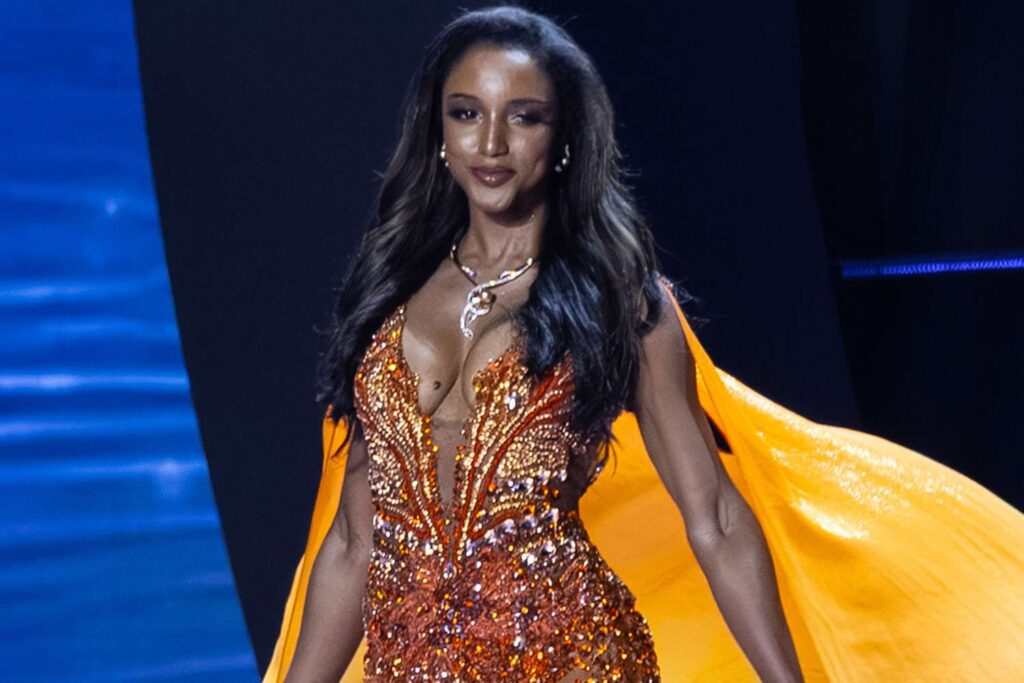 Miss Jamaica largely withdraws from Miss Universe pageant, one day after falling off stage and being hospitalized
