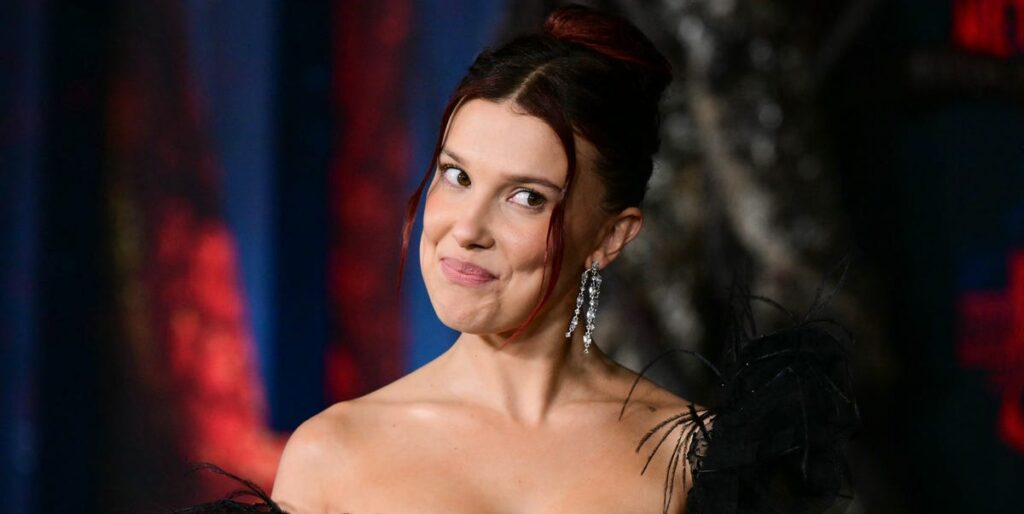 Millie Bobby Brown wears miniskirt with lace gown and corset