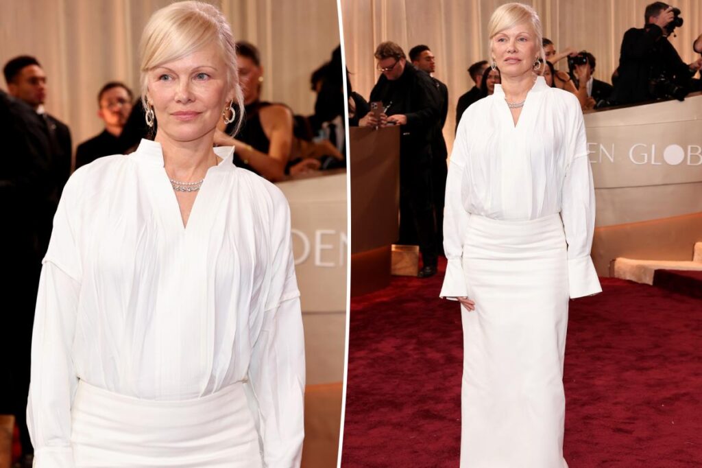 Pamela Anderson flaunts a white button-up dress on the Golden Globe Awards 2026 red carpet