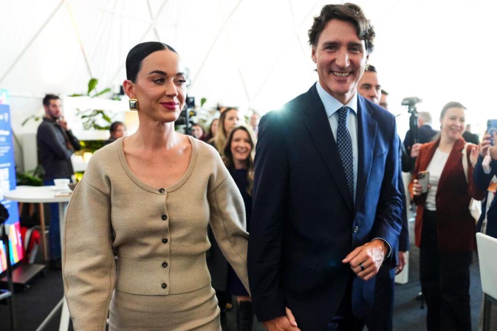 Katy Perry trades her signature wild style for conservative chic with Justin Trudeau at Davos