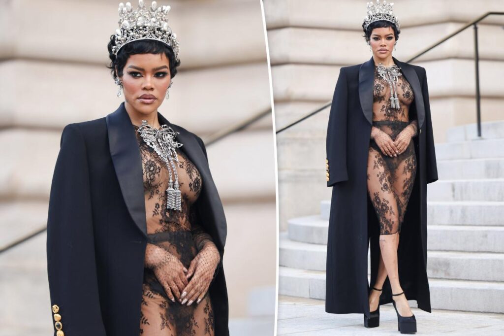 Teyana Taylor attends Schiaparelli haute couture show in see-through lace outfit and pearl crown