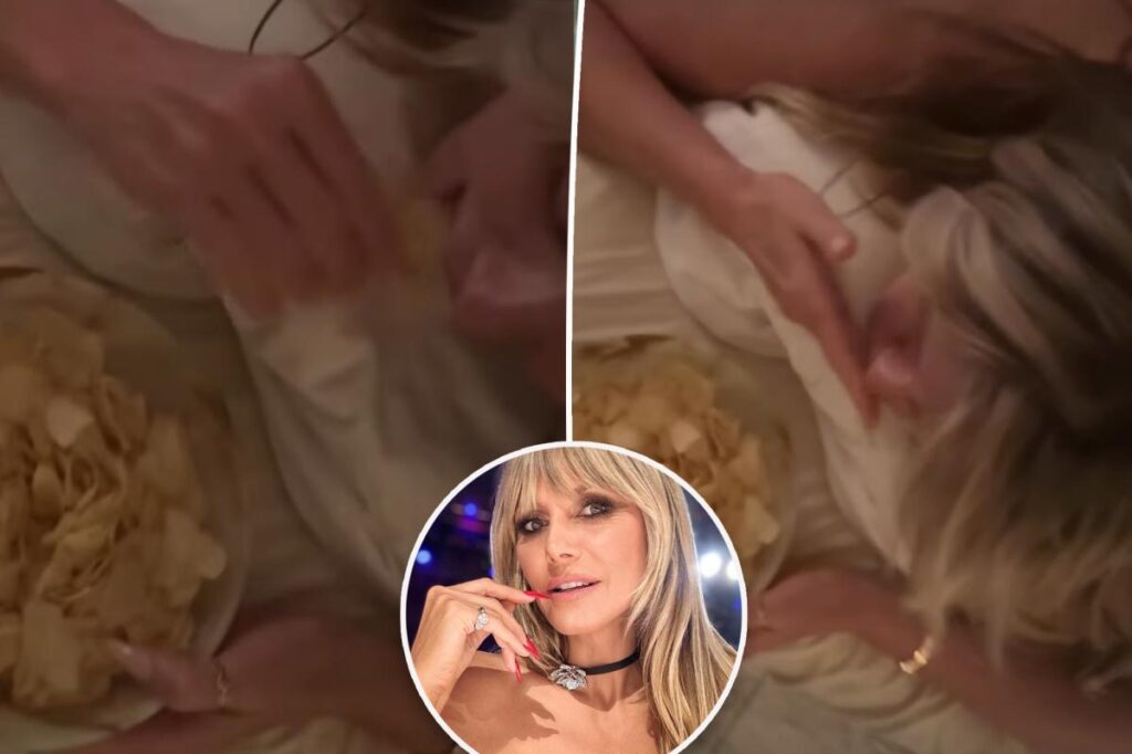 Heidi Klum gets a butt massage while eating potato chips
