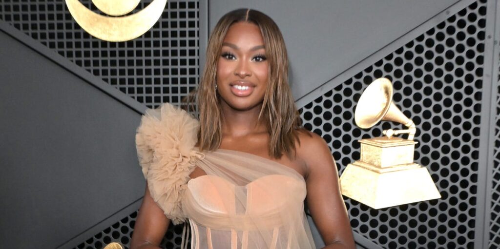Coco Jones wears flirty sheer nude corset dress at 2026 Grammy Awards