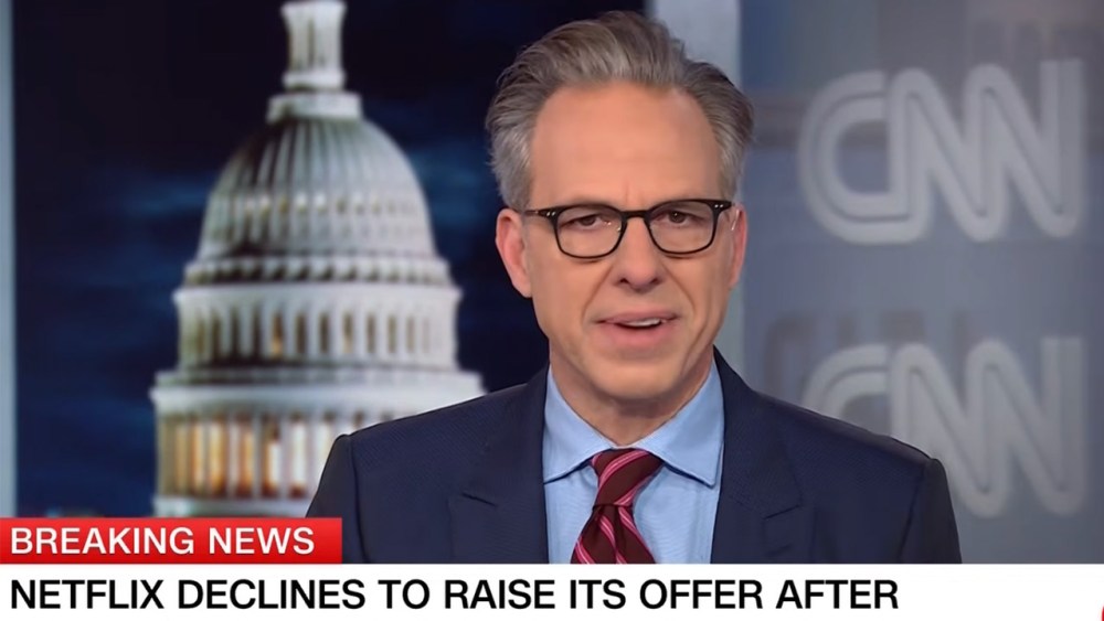 CNN’s Jake Tapper breaks the news of Paramount’s acquisition of WBD live