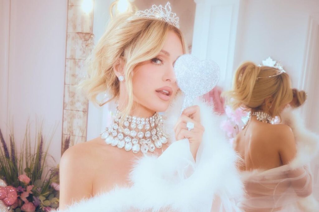 Paris Hilton poses for bathtub photo showcasing skincare brand