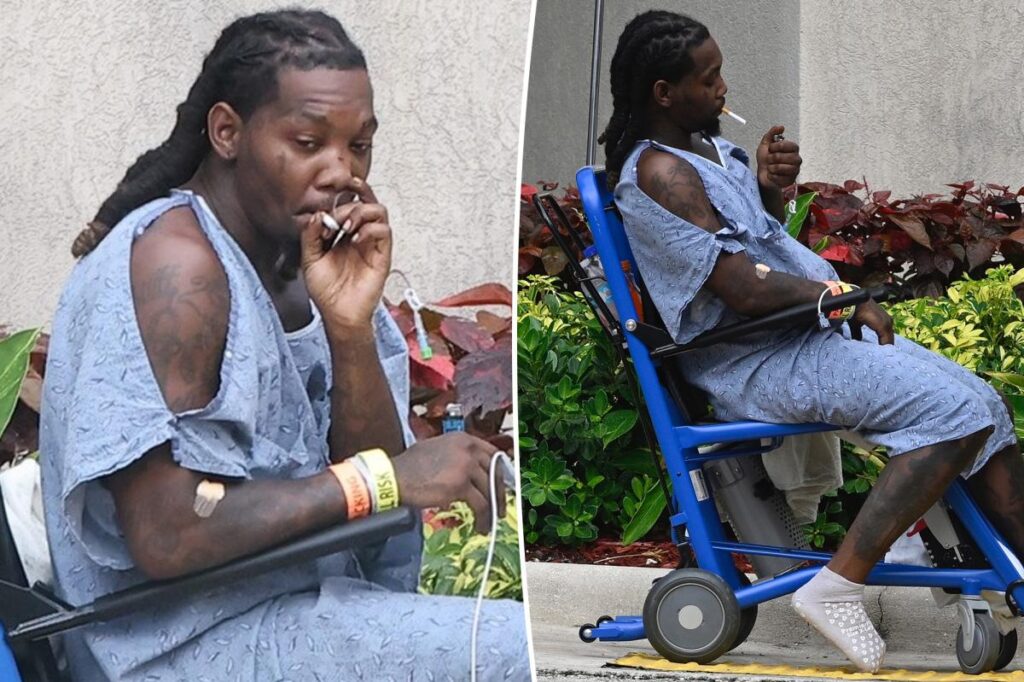 Offset smokes a cigarette outside hospital after being shot in the leg
