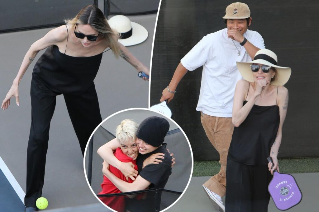 Playful photo of Angelina Jolie playing pickleball with kids