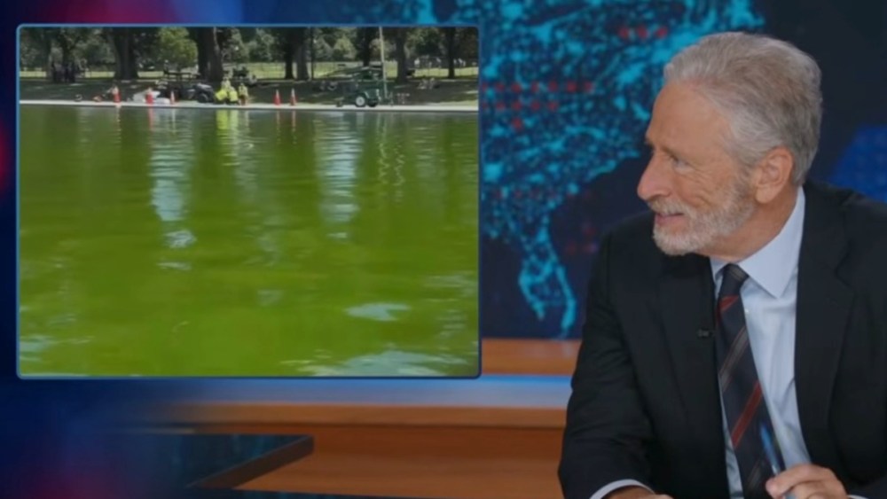Jon Stewart dives into reflecting pool algae infestation