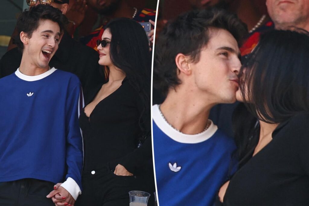 Kylie Jenner and Timothée Chalamet kiss for the camera during the 2026 World Cup finals match