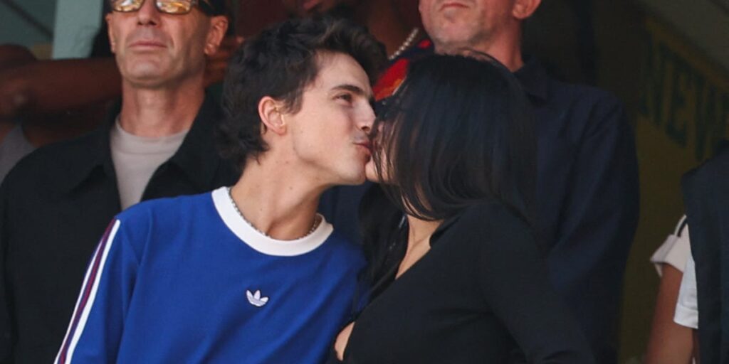 Kylie Jenner and Timothée Chalamet share a kiss at the World Cup final
