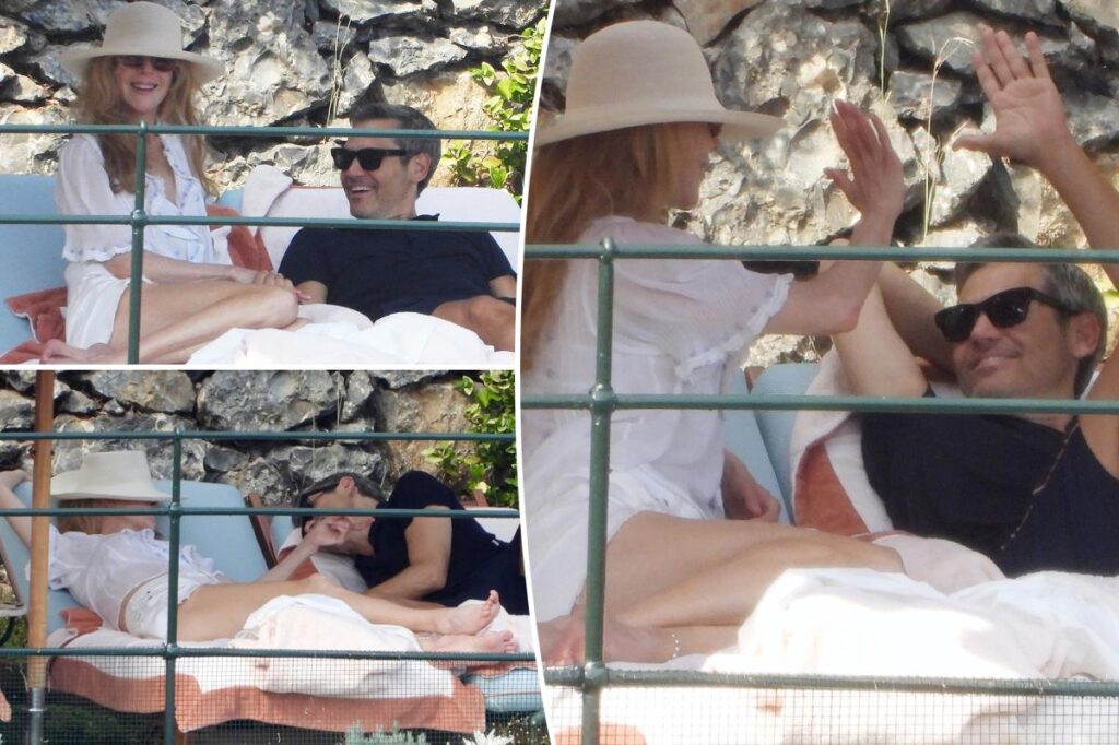 Nicole Kidman and businessman Michael Reinstein enjoy drinks by the pool in Italy